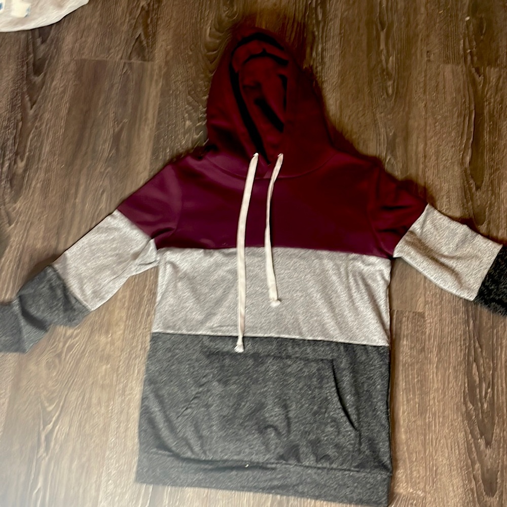Red, gray, and black multicolored oversized hoodie.